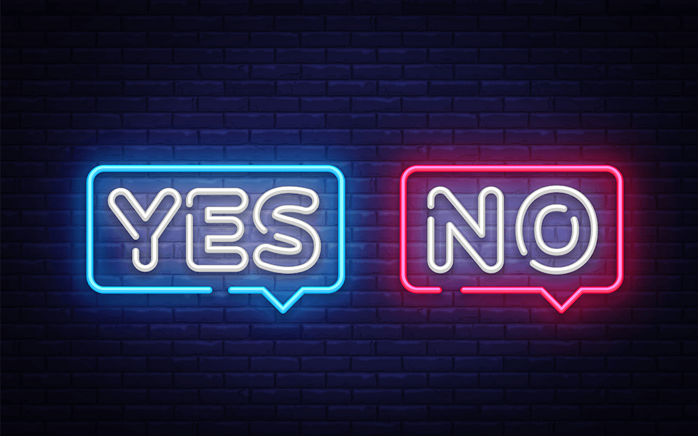 A dark wall with glowing words of Yes or No.